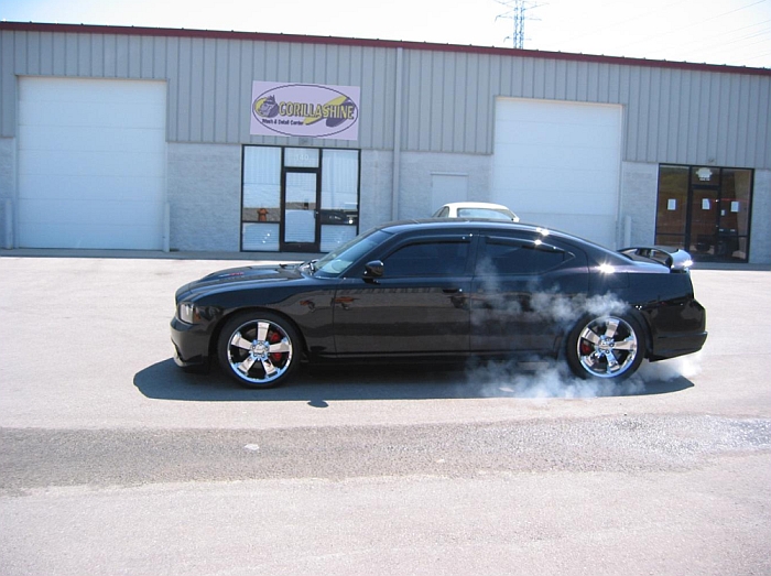 Custom Charger having a little fun in front of the shop!